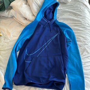 Blue Nike hoodie. Size M.